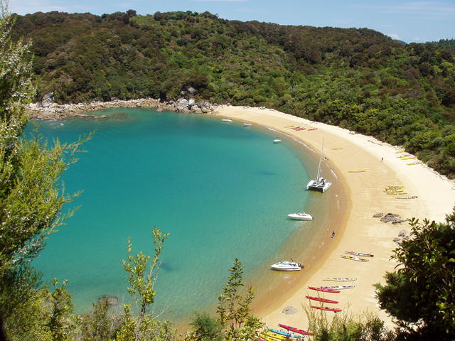 Beautiful beach with boats - free image