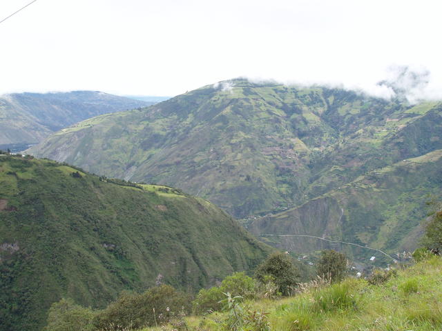 Mountain peaks covered with clouds - free image