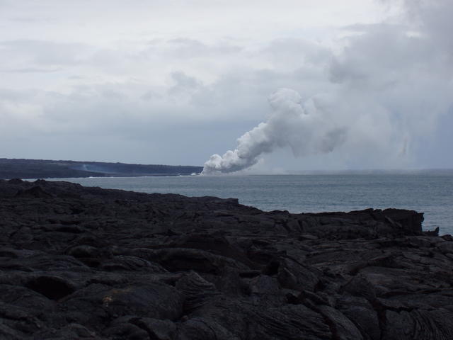 seashore with vulcanic smoke - free image