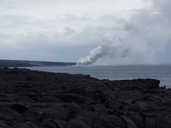 seashore with vulcanic smoke