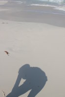 woman shadow on the beach
